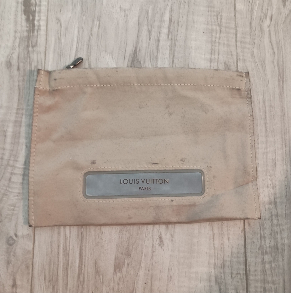 LOUIS VUITTON Truth Voyage Pouch Beige Monogram Polyester